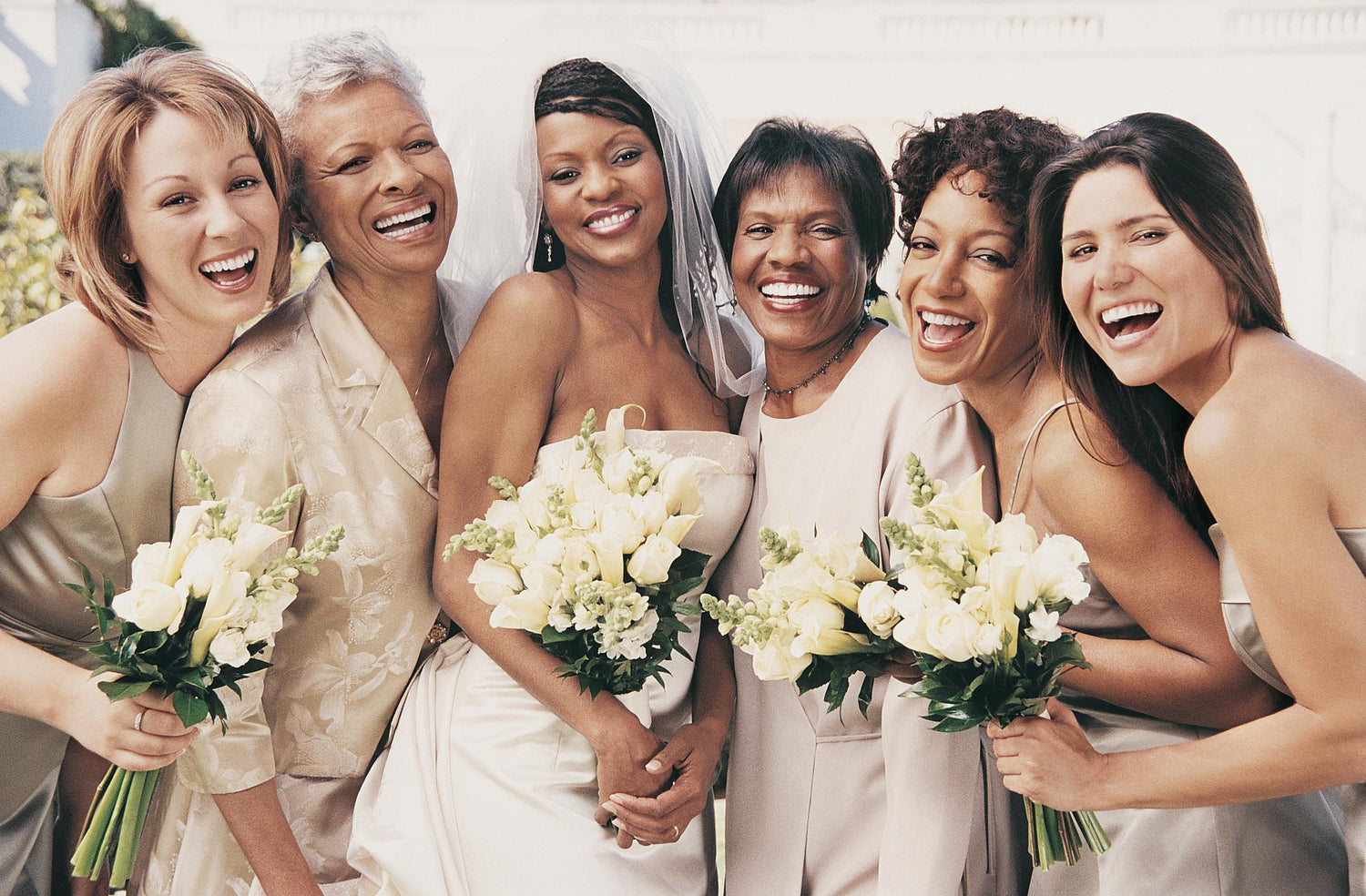 mother of the bride and groom with the bride