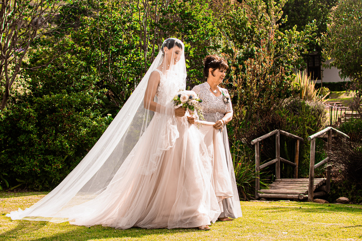 bride walking with her mother
