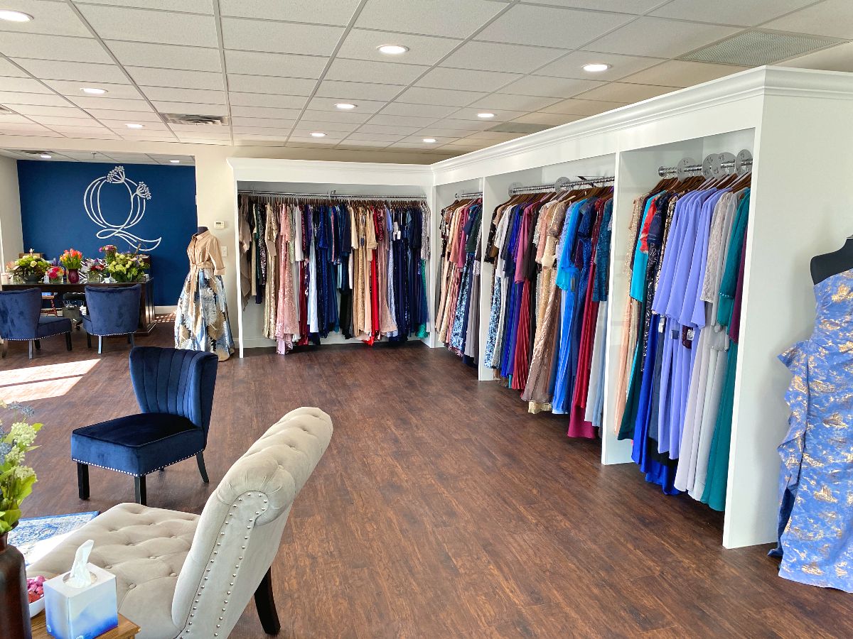 dress racks inside The Queen's Lace