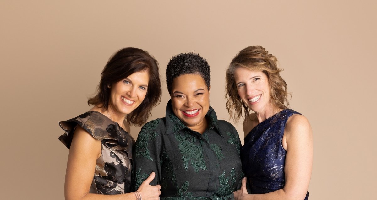 3 beautiful moms wearing elegant mother of the bride dresses